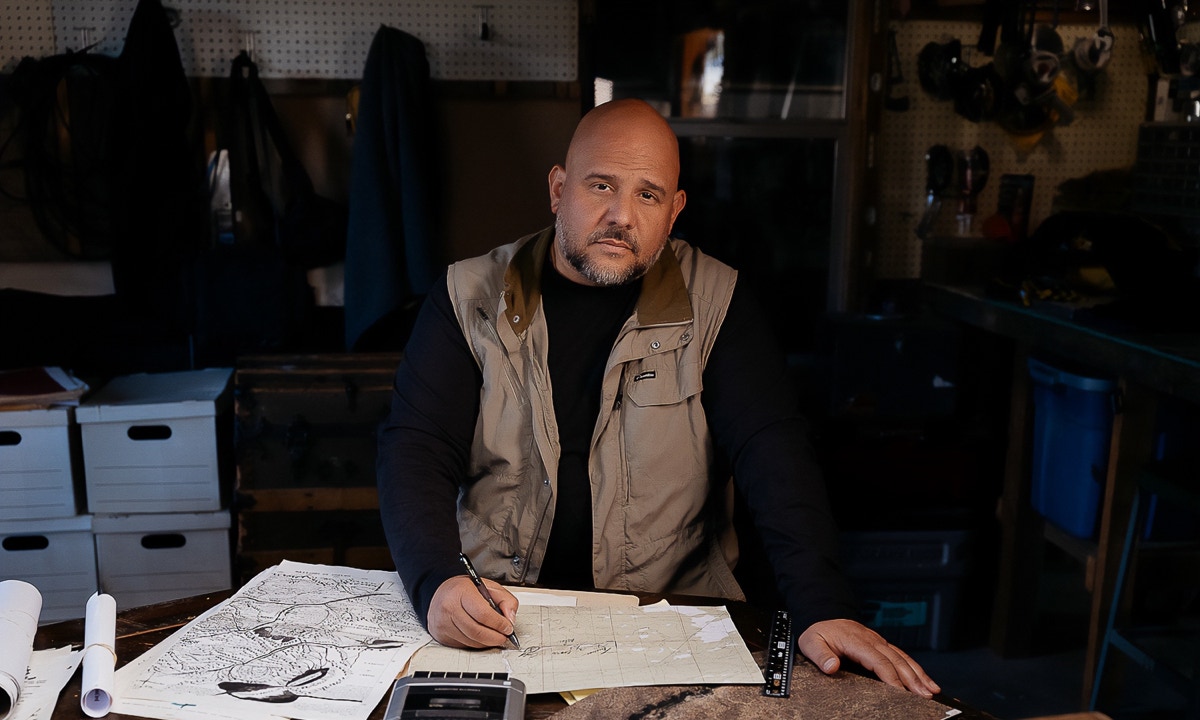 image of dan dillman at a desk doing research